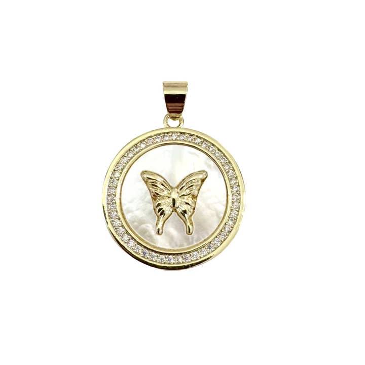 Carded Huggie Charm: an 18k gold-plated charm with cubic zirconia details.