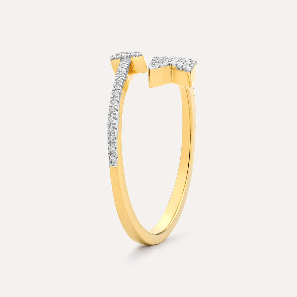 Side view of a gold-plated open band ring featuring two diamond-studded arrow-shaped ends.