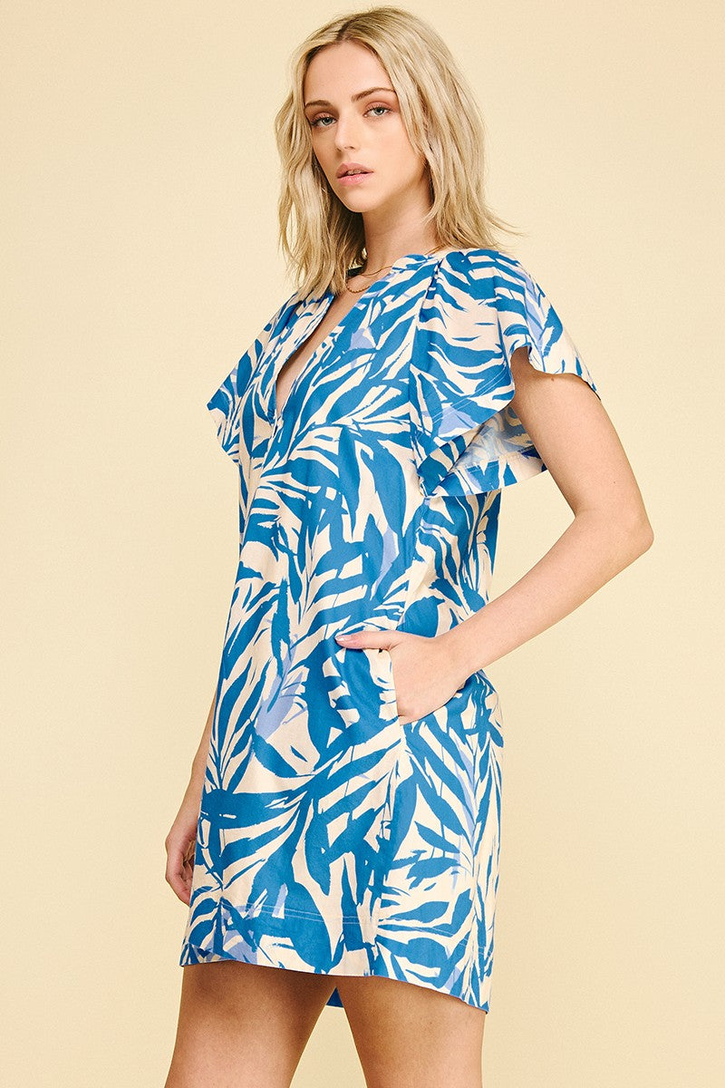 Leah botanical print cotton mini dress with V-neck, cap sleeves, side pockets, and button-down front in a small size.