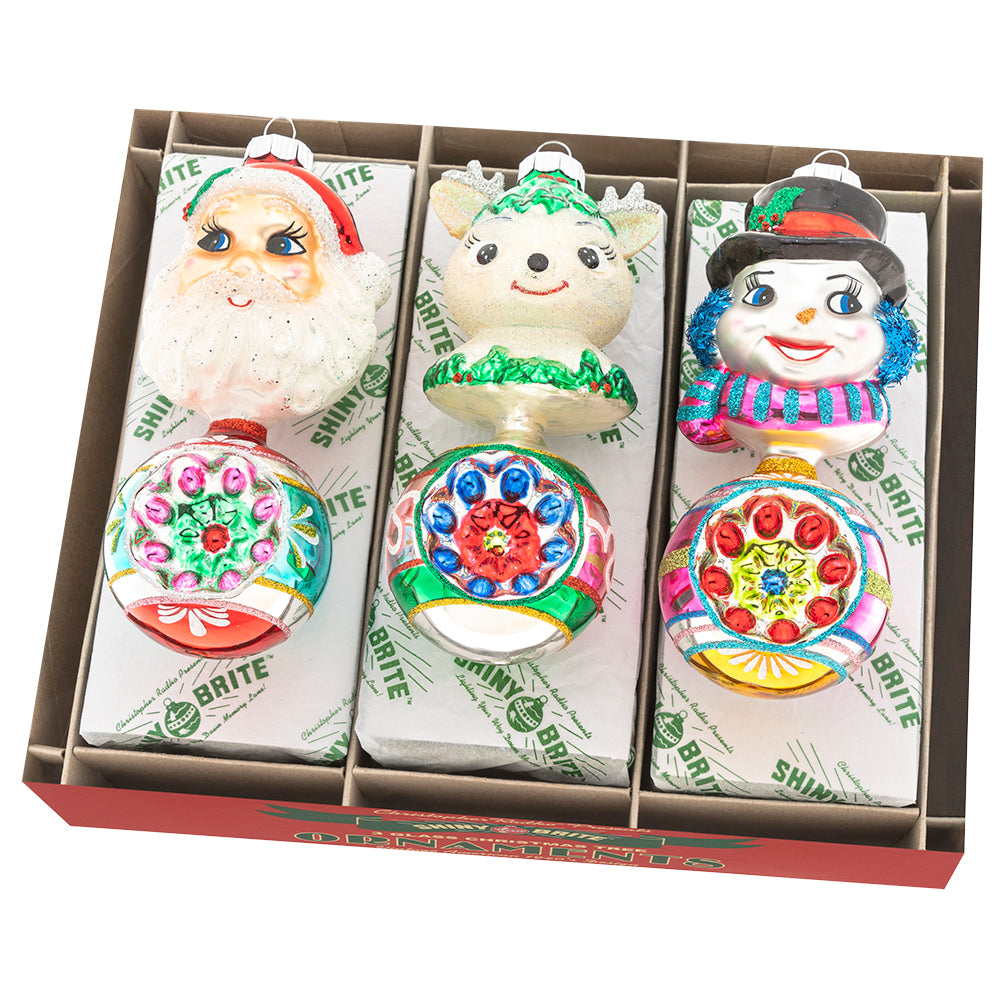 Set of three 5.5-inch glass Christmas ornaments featuring Santa, a reindeer, and a snowman.