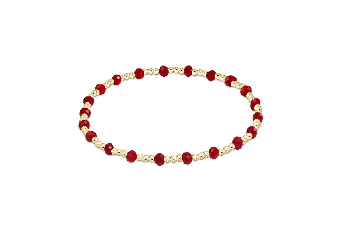 Gameday Flirty Sincerity Bracelet featuring alternating gold beads and faceted red crystals.
