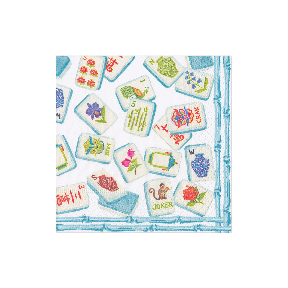 Packaged cocktail napkins with printed designs in triple-ply material.