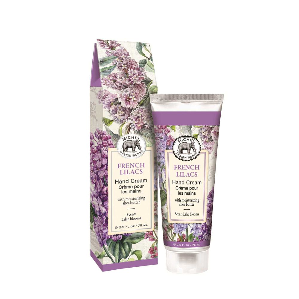 Michel Design Works French Lilacs hand cream tube and matching box with purple floral pattern.