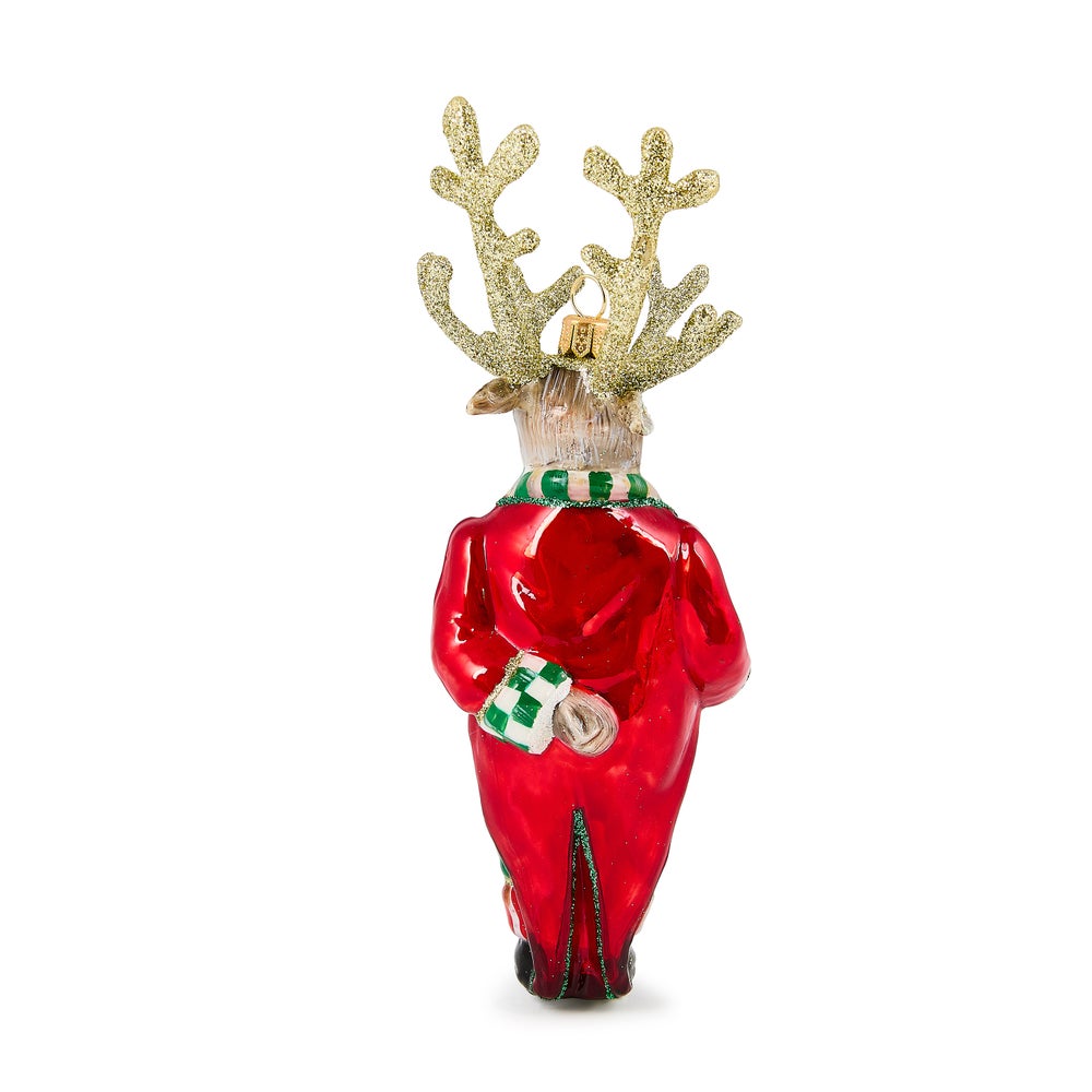 Back view of a glass reindeer butler ornament wearing a red coat with green and white accents.