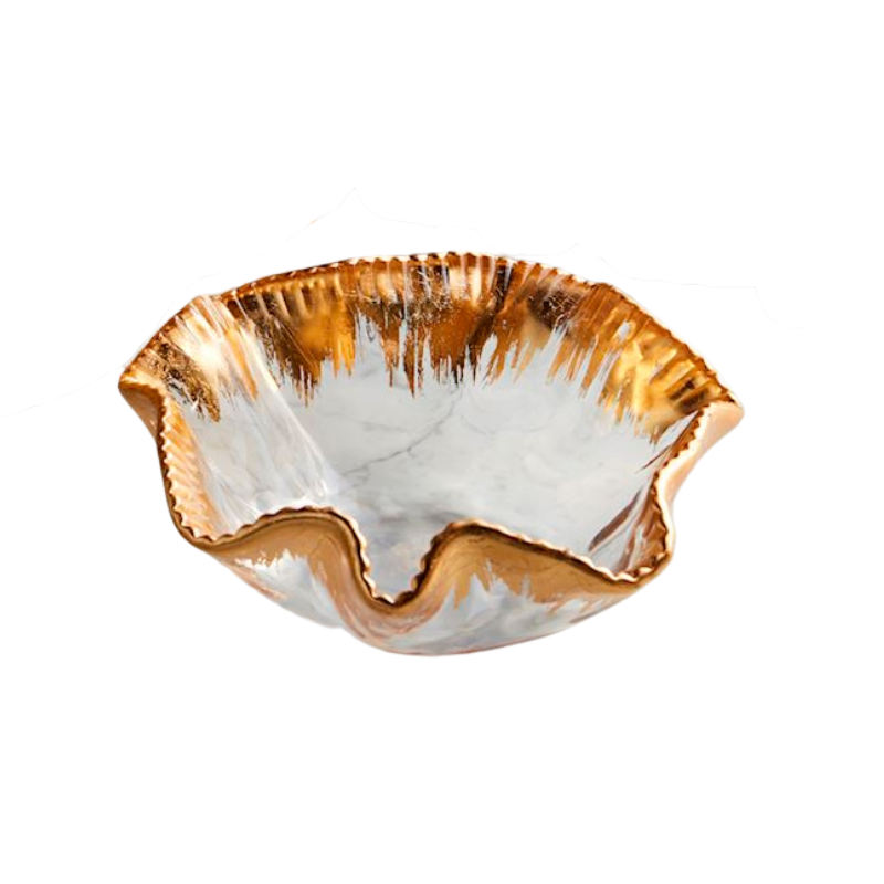 Glass ruffle bowl with a fluted hand-painted gold edge and a white marble-patterned interior.