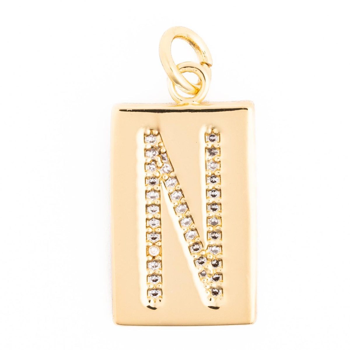 Gold rectangular charm featuring the letter N embellished with small clear crystals.