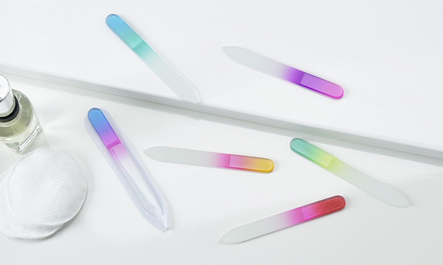 Transparent glass nail file with a rectangular shape.