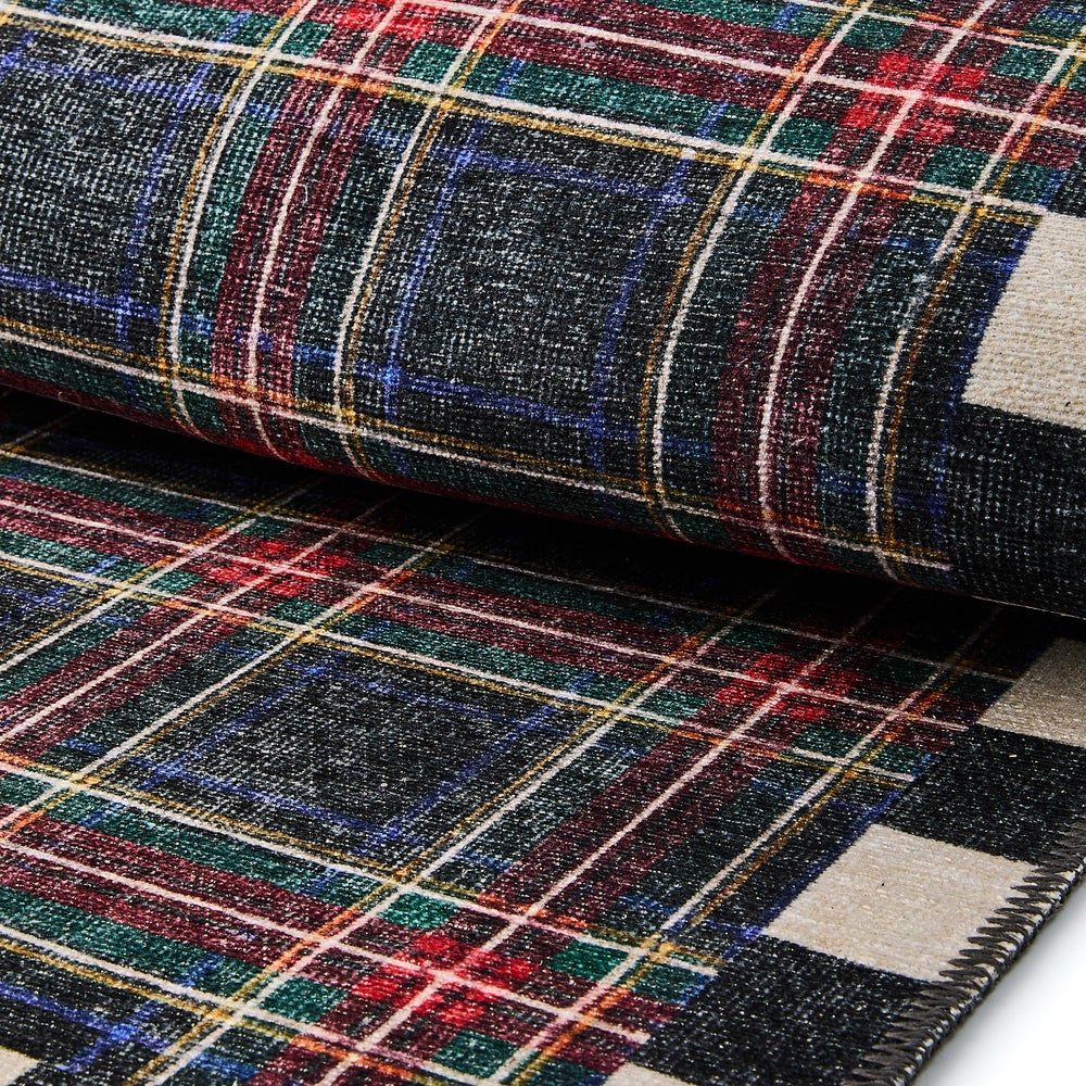 Black Stewart tartan washable runner rug with polyester pile