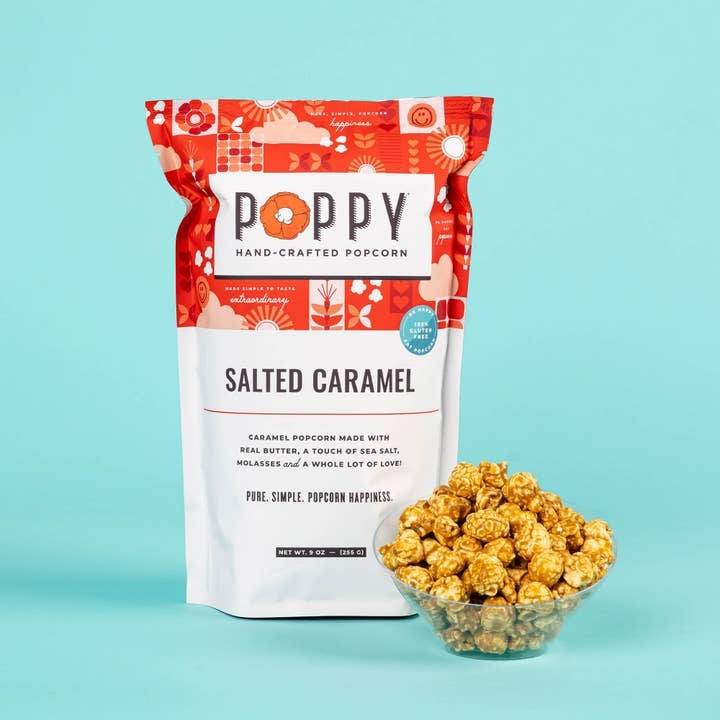 Open bag of white cheddar popcorn with visible dill flakes