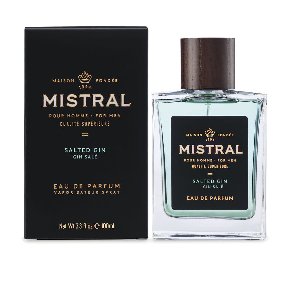 Bottle of Salted Gin Eau de Parfum with a clear glass body, white cap, and label featuring grapefruit and botanical imagery.