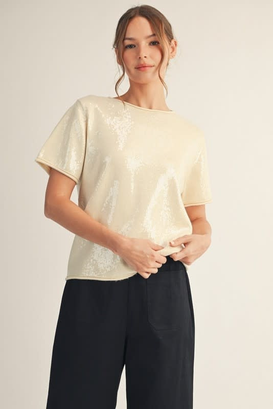 Front view of a Sandy sequin-covered sweater top with raw cut edge detail.