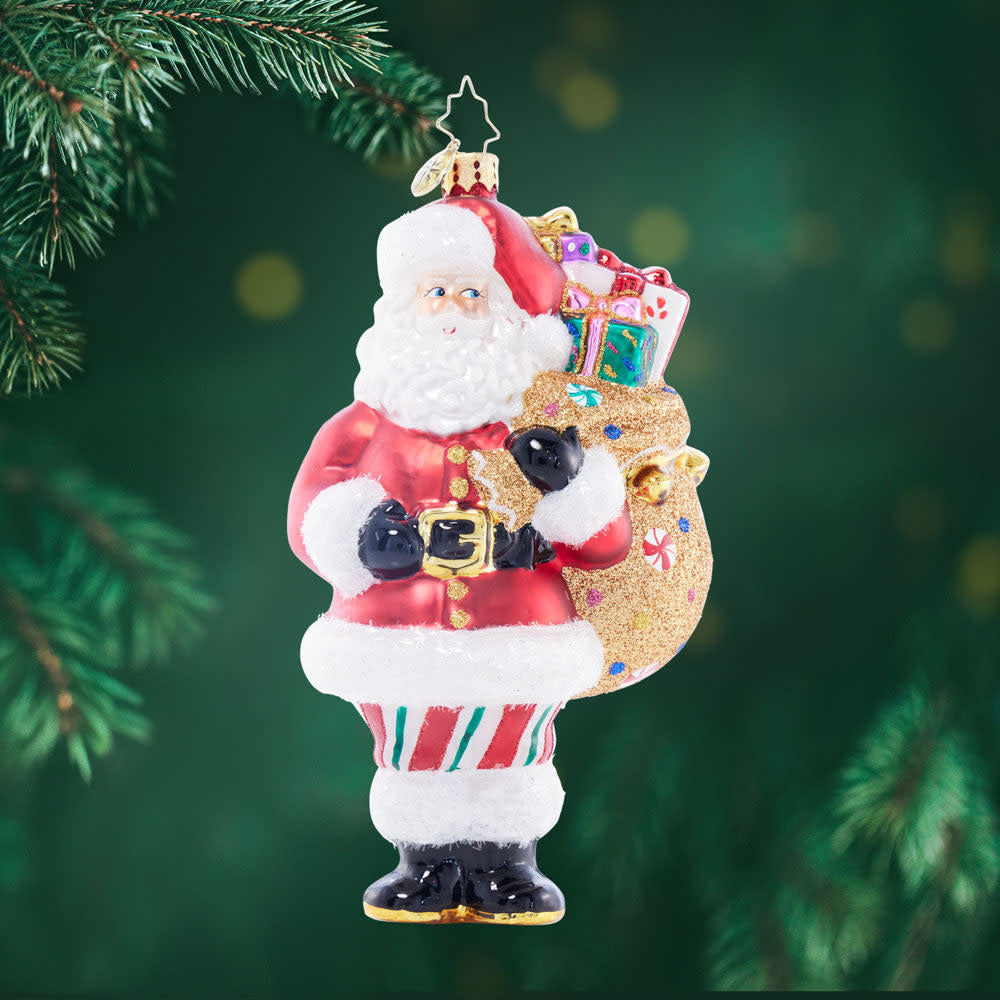 Santa's Bag of Christmas Wonders: a small red fabric bag with white trim and gold accents.
