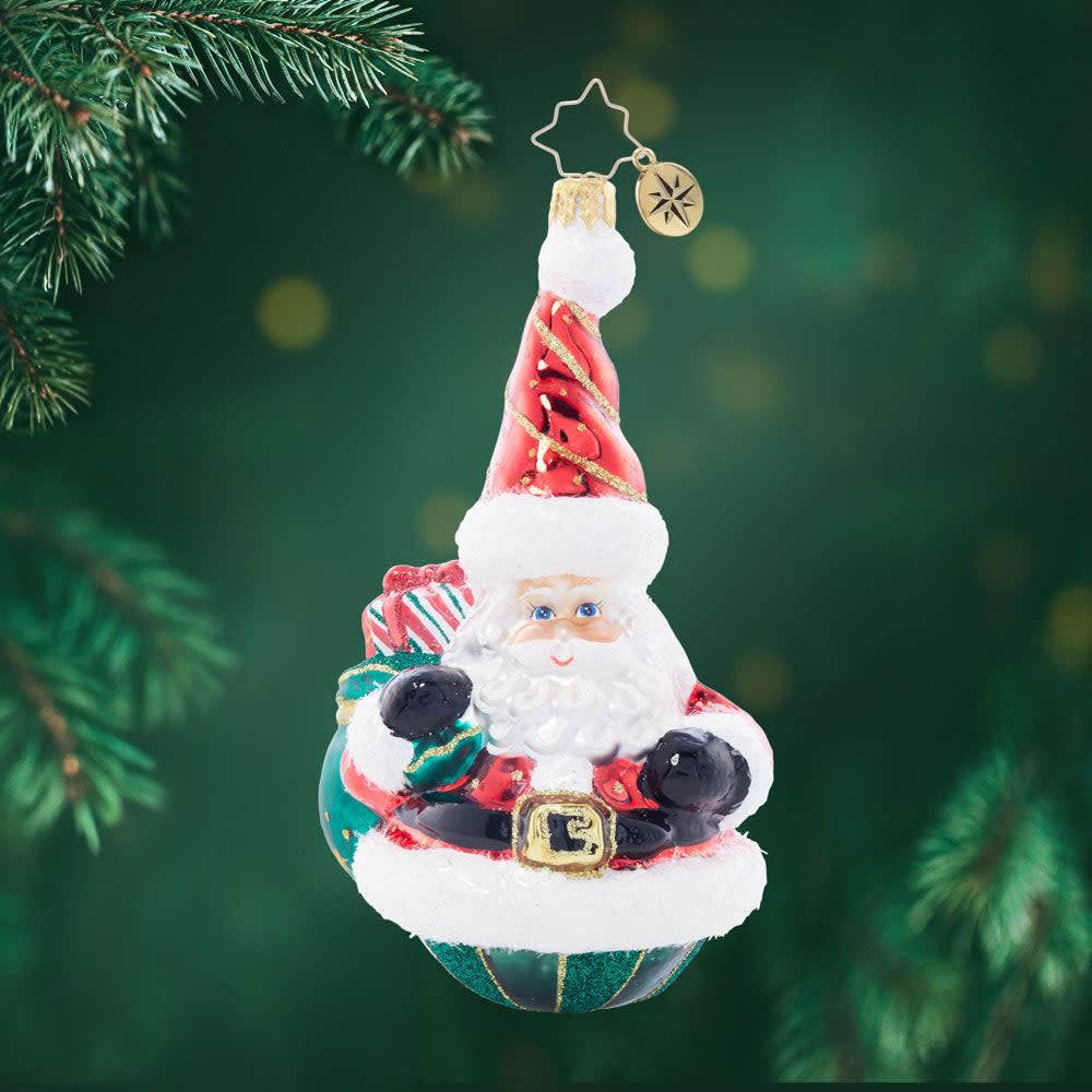 Santa's Gift Haul ornament in red with gold accents depicting a gift haul silhouette.