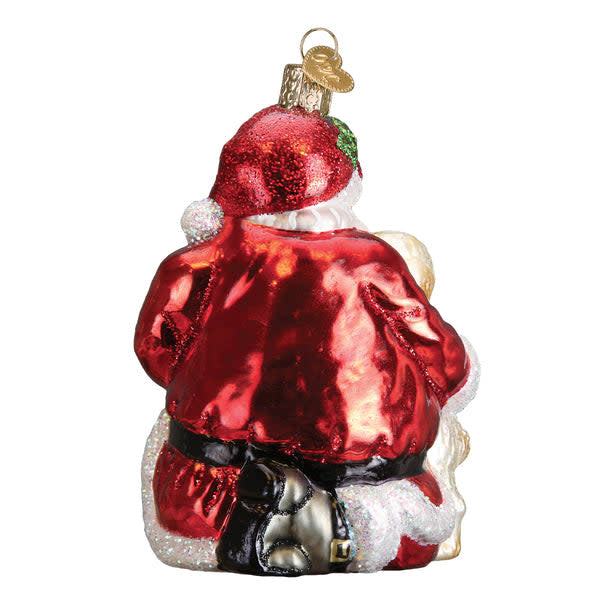 Hand-painted glass ornament shaped like a puppy with red collar against white background