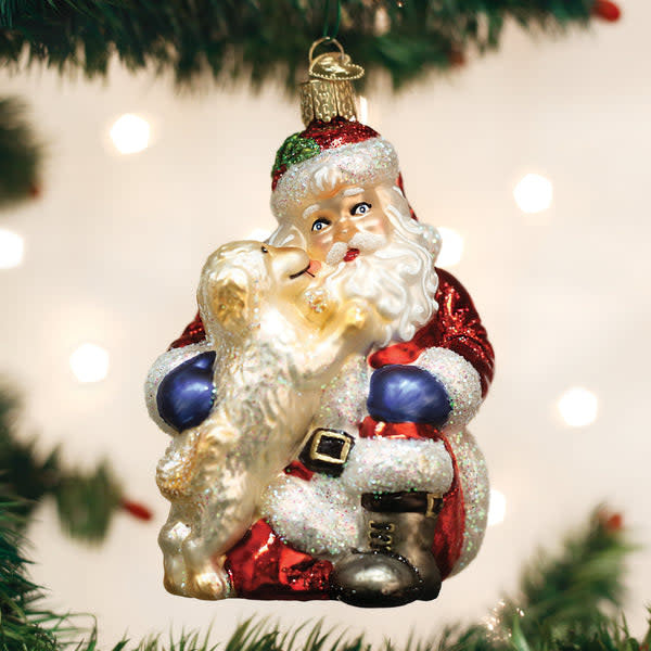 Hand-painted glass Christmas ornament shaped like a puppy with red collar against white background