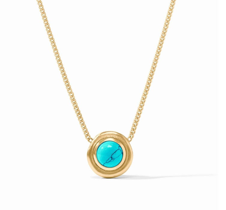 Delicate turquoise blue wave stone necklace with a simple pendant on a fine chain.
