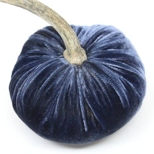 Handmade sapphire velvet pumpkin with a natural stem.