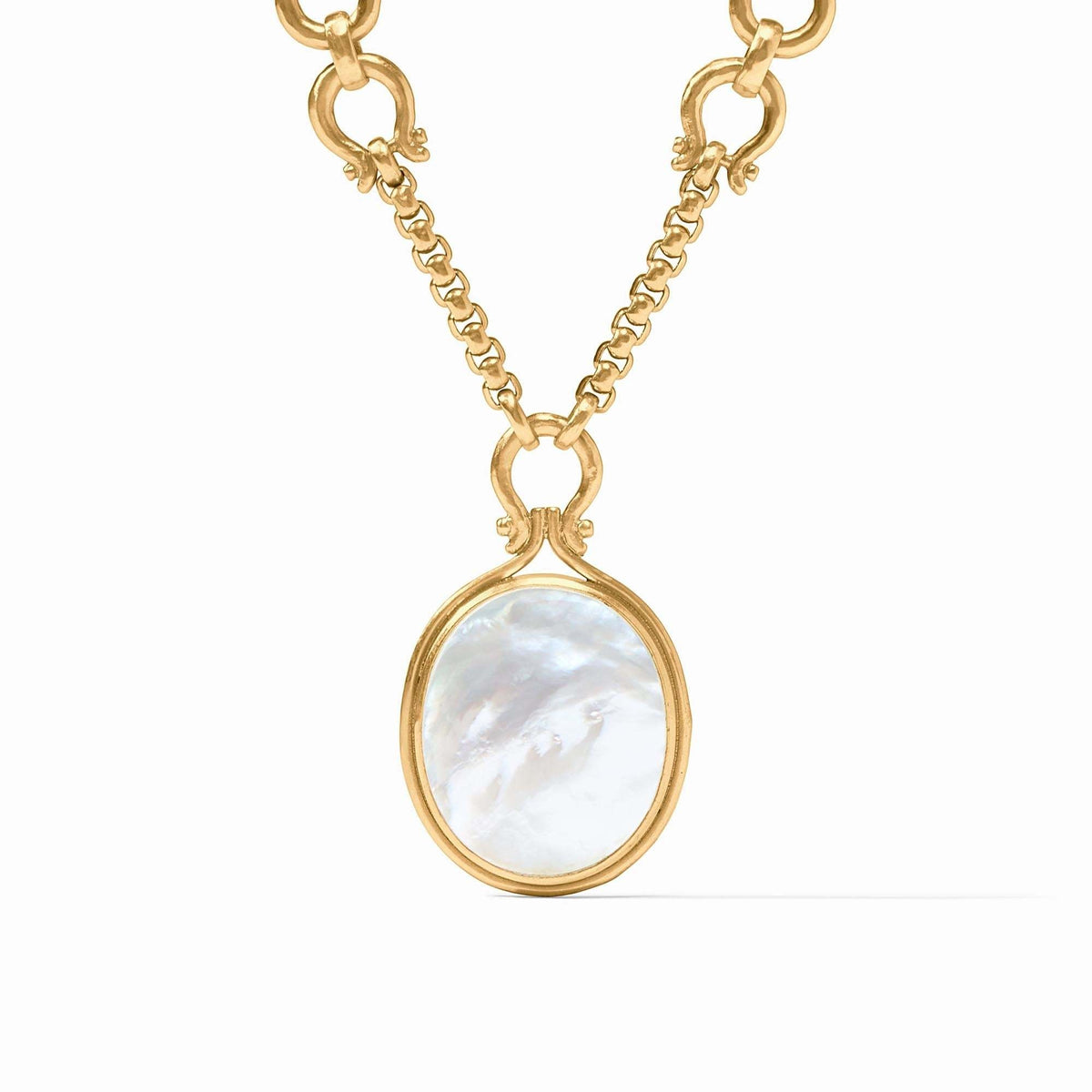 Adjustable statement necklace with a mother-of-pearl pendant hanging from golden horsebit and Venetian box chain.