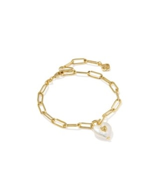 Gold over brass paperclip chain bracelet featuring a heart-shaped freshwater cultured pearl charm with a metal beauty mark.