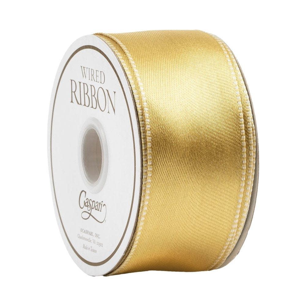 Spool of satin ivory wired ribbon with gold reverse side