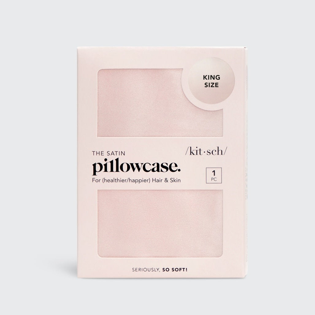 Satin pillowcase in a soft neutral tone with smooth texture.
