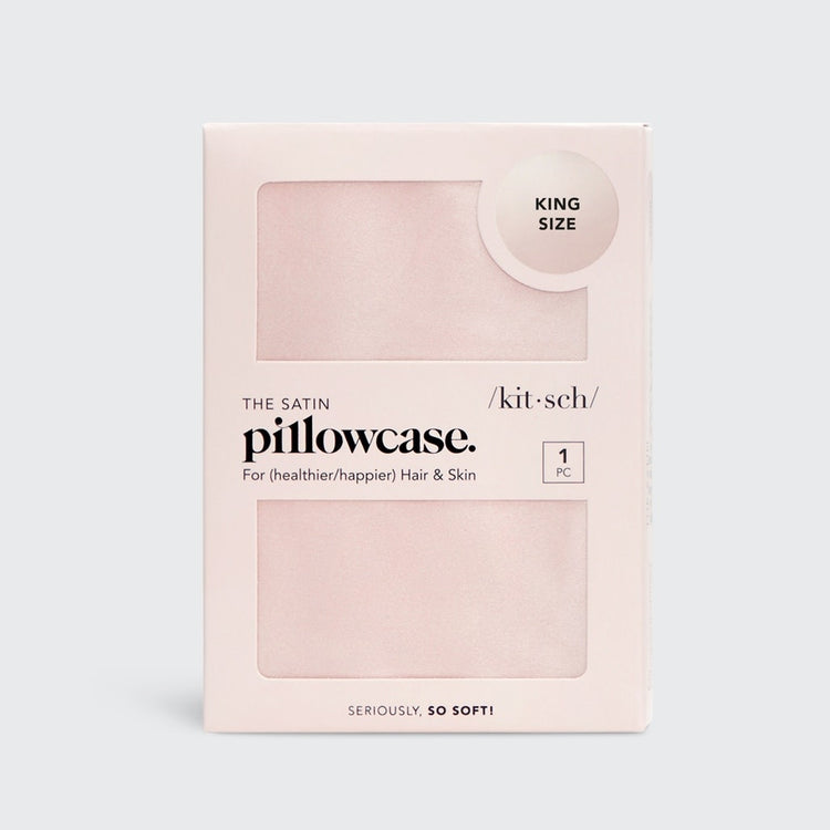Satin pillowcase in a soft neutral tone with smooth texture.