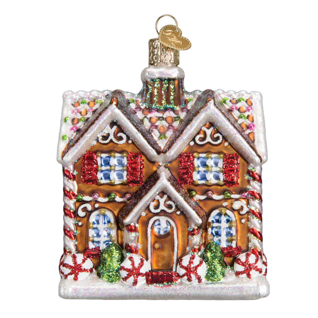 Gingerbread house Christmas ornament with glittery snow, red shutters, and candy cane accents.