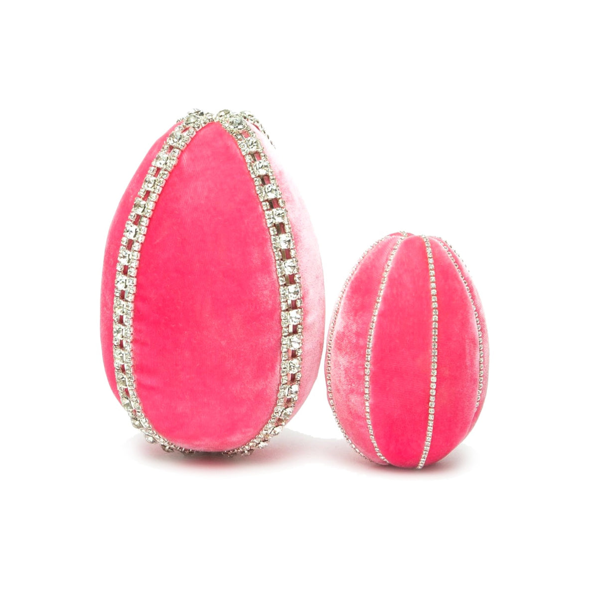 Two pink velvet eggs, one large and one small, decorated with rows of rhinestones.