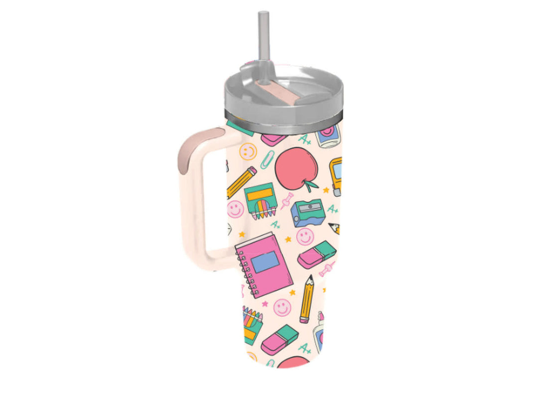 30 oz tumbler with handle and straw, featuring a light pink background with school supply pattern.