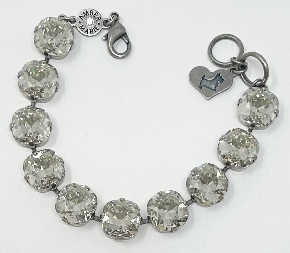Premier Bracelet - New York featuring large cushion-cut clear crystals and a heart-shaped dog charm.