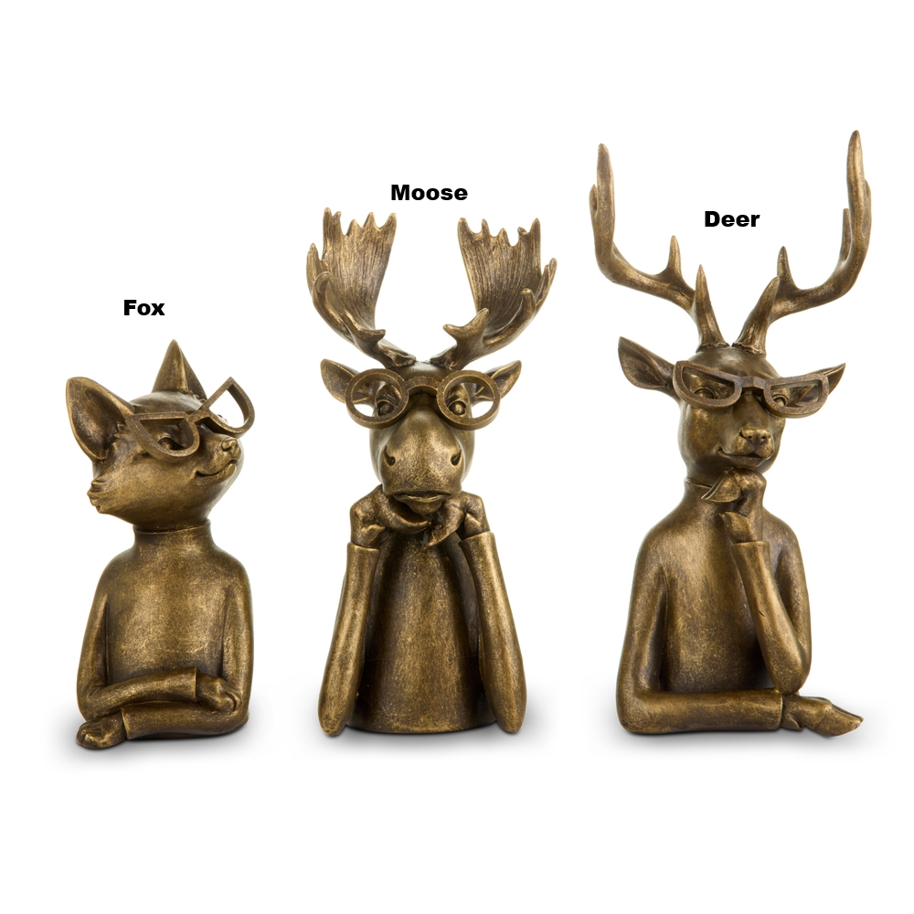 Three bronze-finished resin woodland animal figurines: a fox, moose, and deer wearing spectacles.