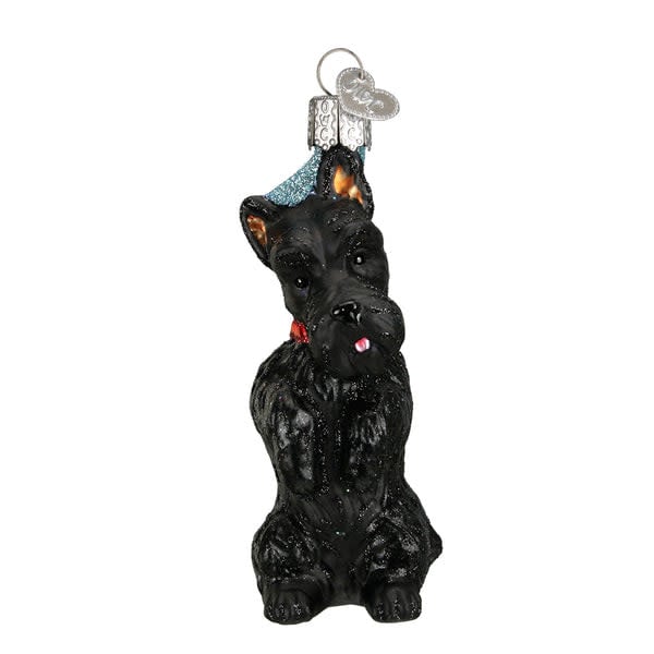Black Scottish Terrier ornament with wire frame standing on a gold base.