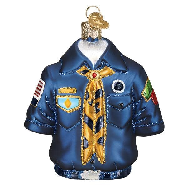 Glass ornament shaped like a scout uniform with silver accents and hand-painted glitter finish.
