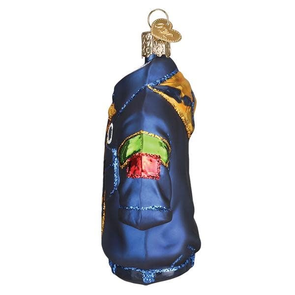 Glass ornament shaped like a scout uniform with silver accents and hand-painted glitter finish