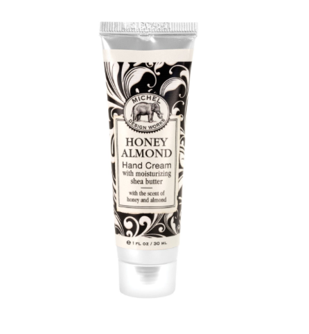 Mini tube hand cream in honey almond scent with shea butter.