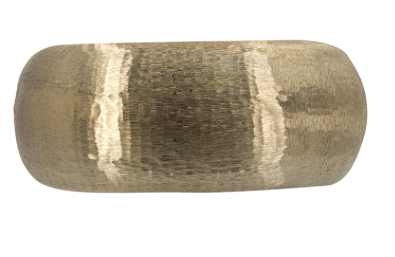 Gold suede-finish aluminum vase with a rounded industrial silhouette on a tabletop.