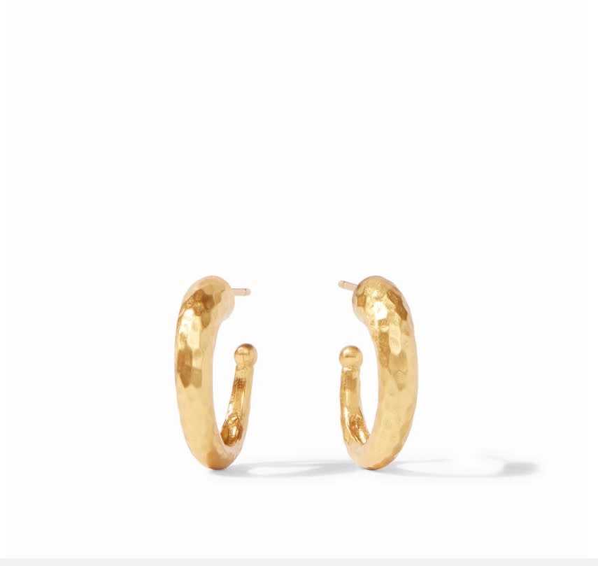 Gold-plated hammered hoop earring with a thick-to-slender curved silhouette.