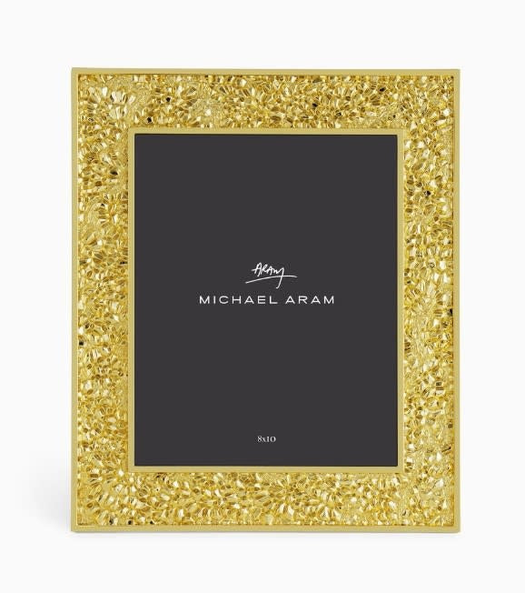Goldtone metal frame with pomegranate motif holding an 8x10 photo