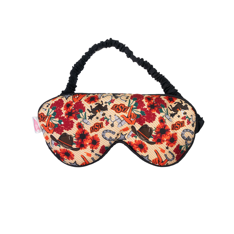 Silk twill sleep mask with Oklahoma State University pattern featuring flowers and cowboy motifs.