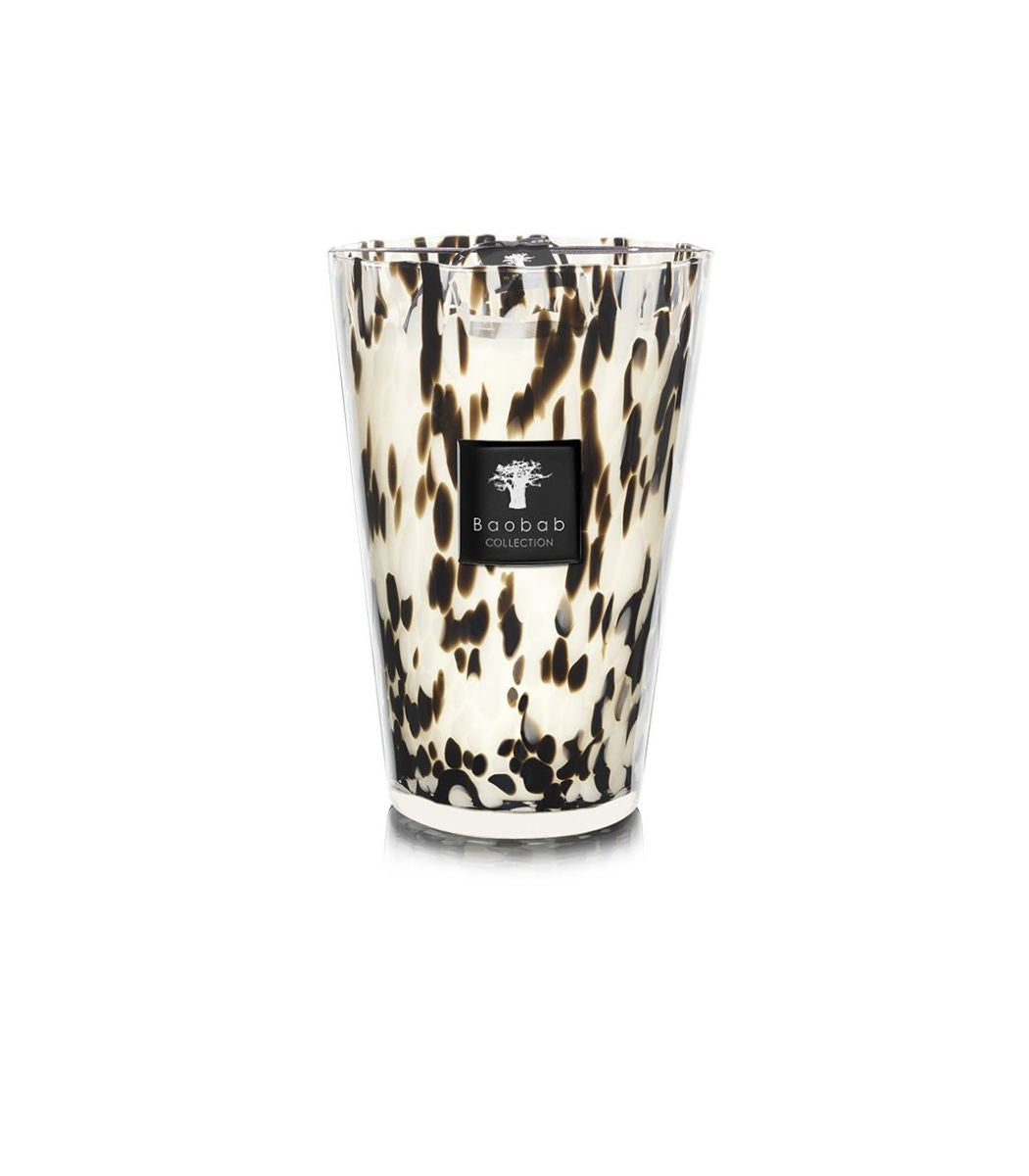 Baobab Collection Black Pearls candle in a white and black speckled glass vessel.