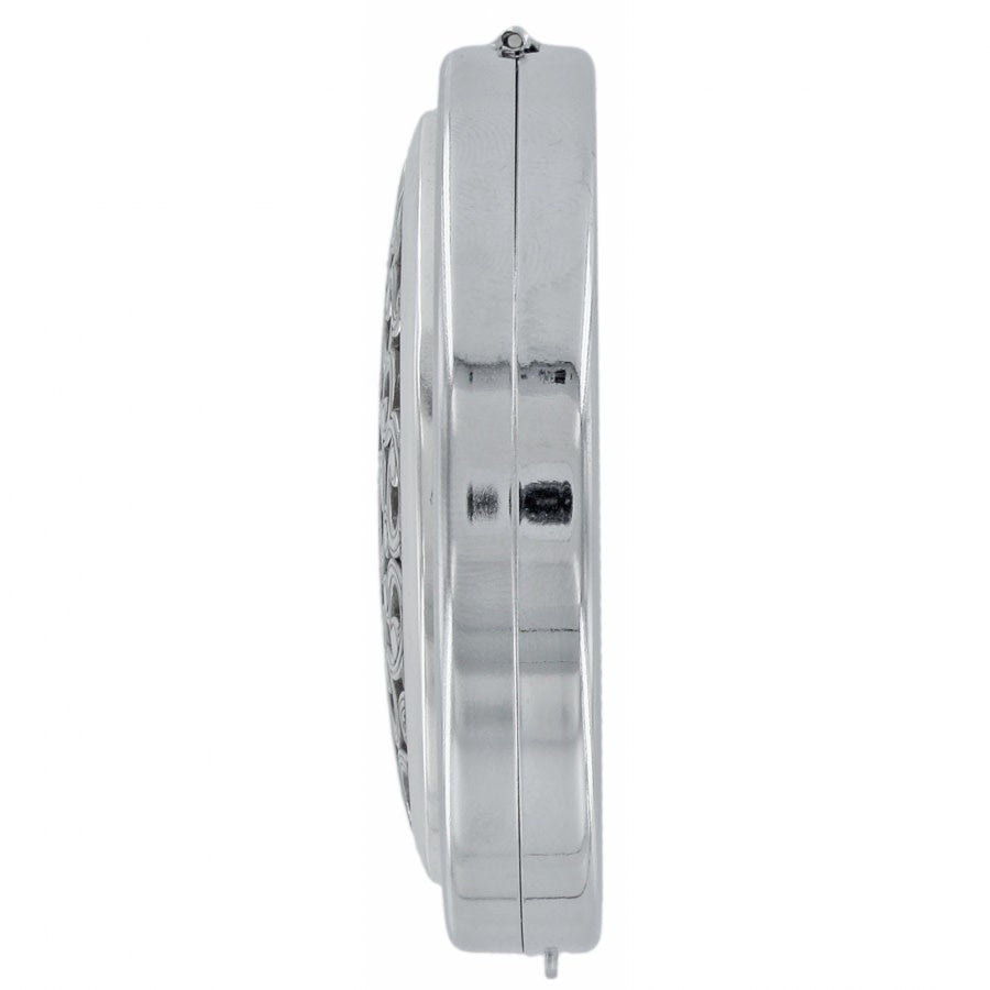 Silver plated compact mirror with sculpted frieze patterns on the lid.