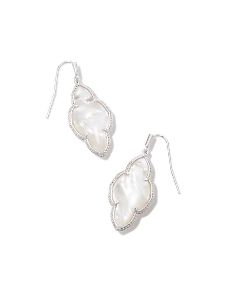 Abbie drop earrings featuring a small circular stud with dangling teardrop-shaped pendants in silver-tone metal.