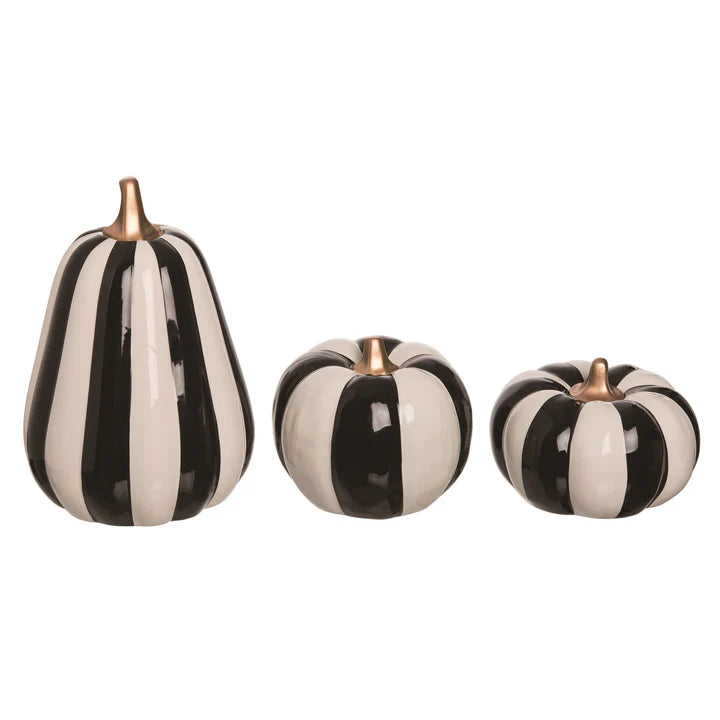 Ceramic striped pumpkin with a natural terracotta finish.