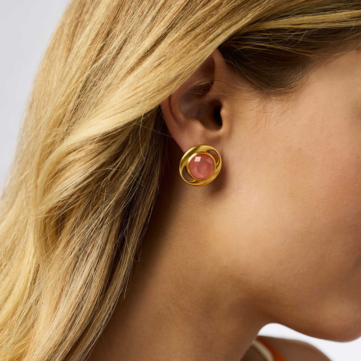 Laguna Stone Stud earrings featuring a small imported glass stone set in polished gold-plated metal with matching backs.