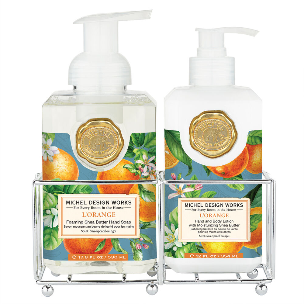 Foaming hand soap bottle with lotion pump in a white caddy.