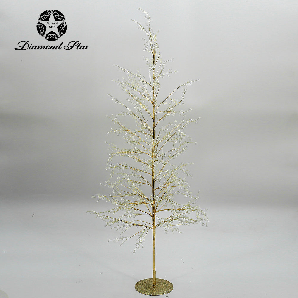 Gold decorative Christmas tree with crystal accents on a glittery base