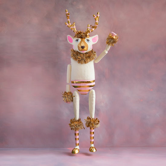 La Renee the Reindeer Display in papermache with a gold, cream and pink color scheme.