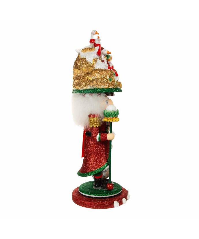 Side view of an 18-inch Hollywood Nutcracker featuring six geese a-laying on its hat.