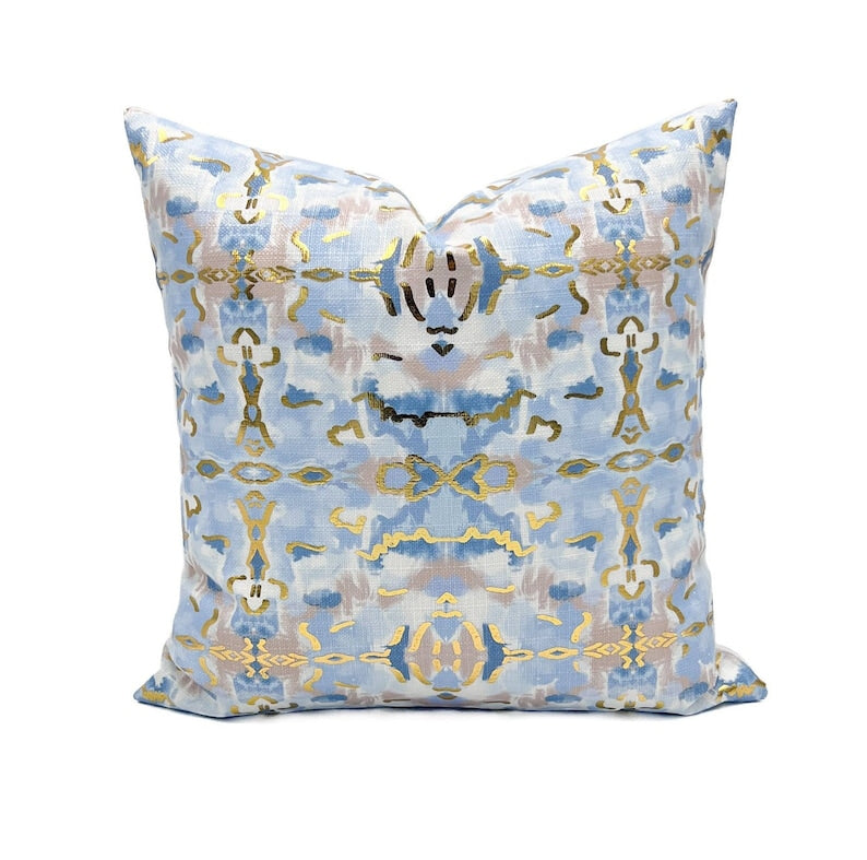Square gold foil kaleidoscope pillow with geometric circular patterns on a feather fiber blend insert.