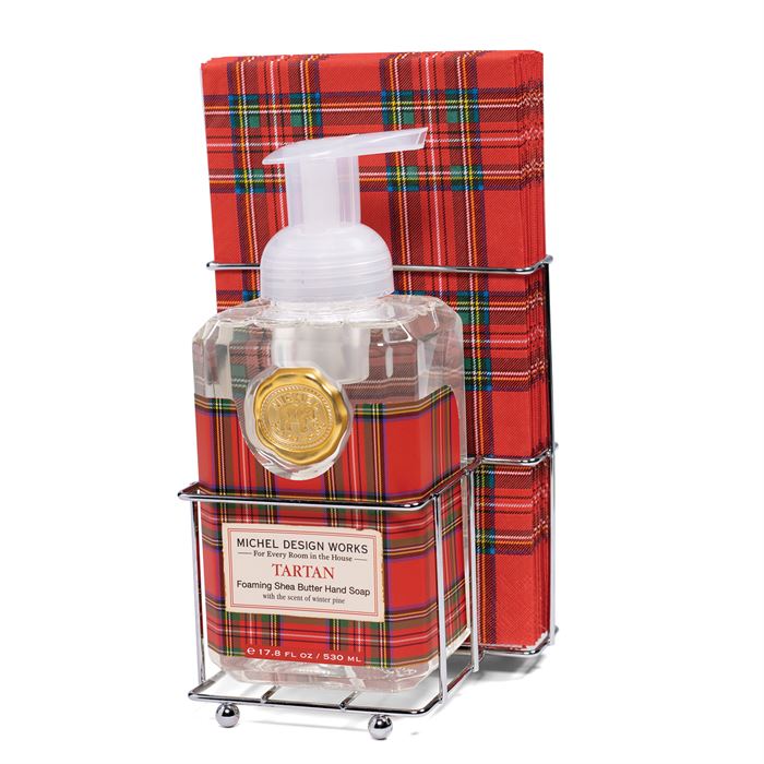Foaming hand soap dispenser with a pack of fifteen napkins